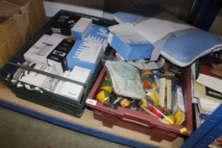 Two boxes of miscellaneous toys, Wii Fitboard, com