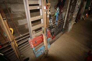 A quantity of long handled garden tools to include