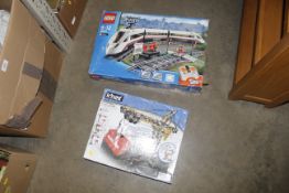 A boxed Lego city set and K'Nex building set