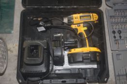 A Dwalt cordless drill with two batteries and char