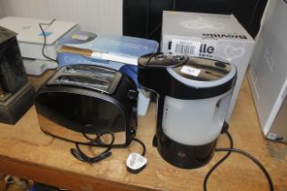 A Breville hot water dispenser with original box and a Cookworks toaster and box