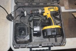 A Dewalt DC725 cordless electric drill with two ba