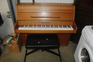 A John Brinsmead upright cottage piano and a piano