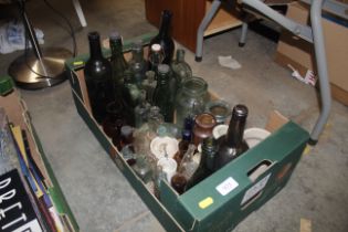 A box of miscellaneous vintage bottles