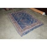 An Eastern flat weave rug of Caucasian design AF a