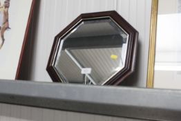 An octagonal bevelled edged wall mirror