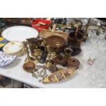 A quantity of various brassware, wooden candle hol