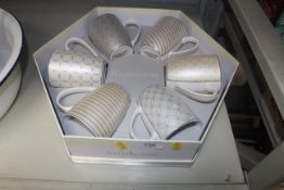 A boxed Belleekliving set of six mugs in original