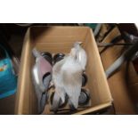 A box containing various decoy pigeons