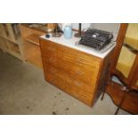 A retro teak and Formica topped chest of two short