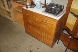 A retro teak and Formica topped chest of two short