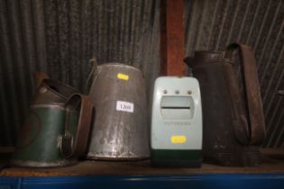 Two oil cans, a galvanised pail with swing handle