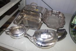 A plated entrée dish and cover, plated tray, plate