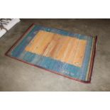 A Gabbeh brightly coloured rug approx. 5'10" x 4'