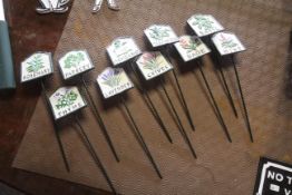 Ten painted cast iron herb markers (203)