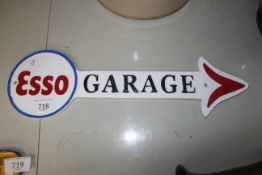 A reproduction case iron Esso garage sign