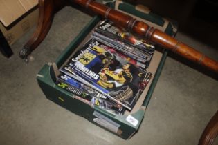 A box of various 'Speedway Style' magazines
