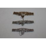 A silver gate link bracelet with padlock clasp and