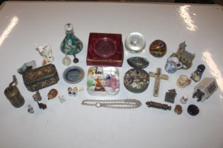 A box containing glass paperweights, a Mdina glass