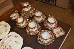 A late Victorian floral decorated part teaset