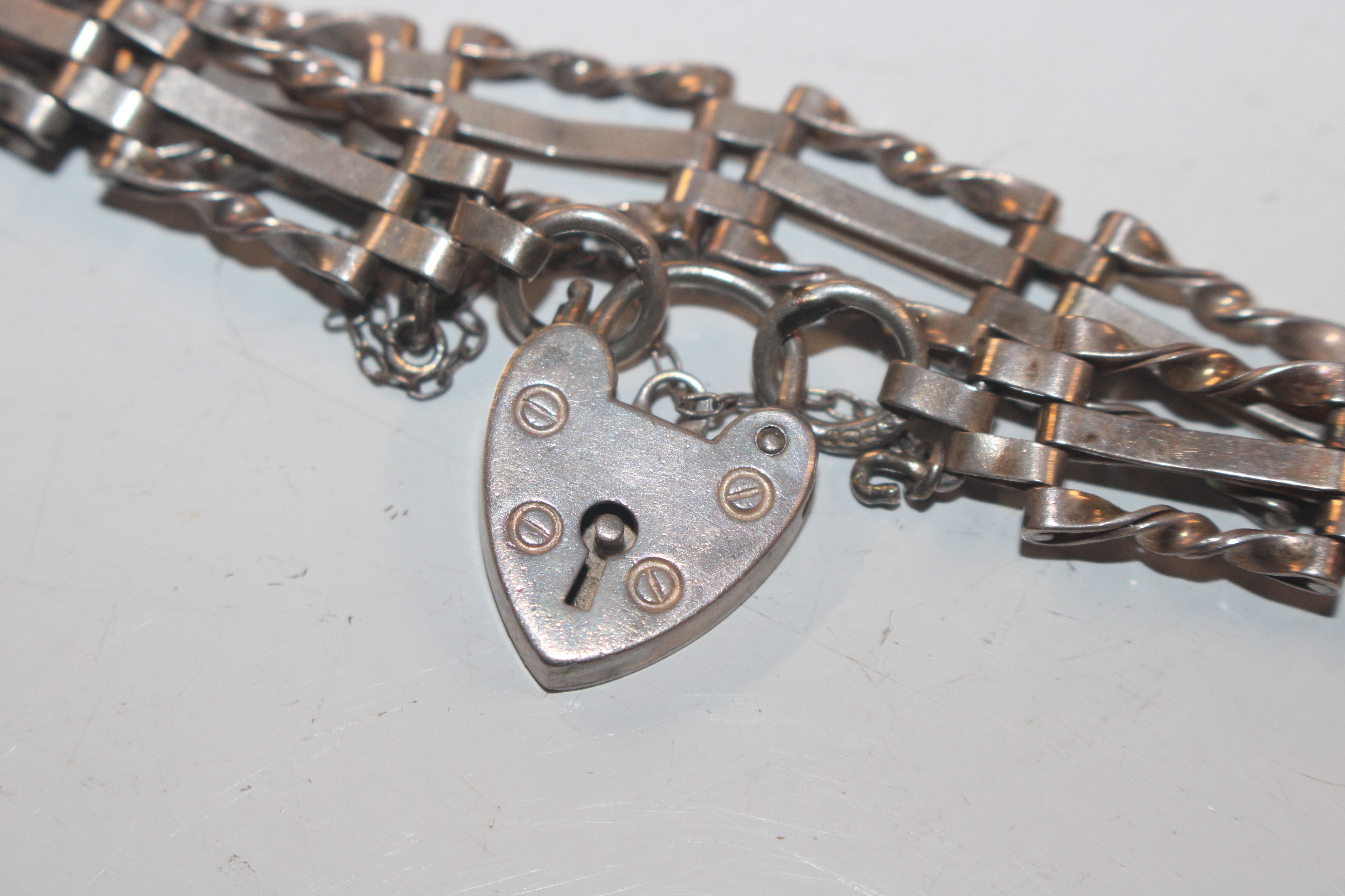 A silver gate link bracelet with padlock clasp and - Image 3 of 12