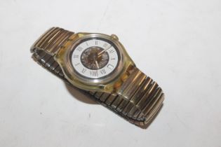 A Swatch automatic wrist watch