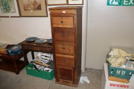 An early 20th Century narrow oak chest with hinged