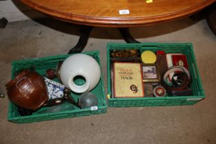 A box of miscellaneous old advertising tins and a