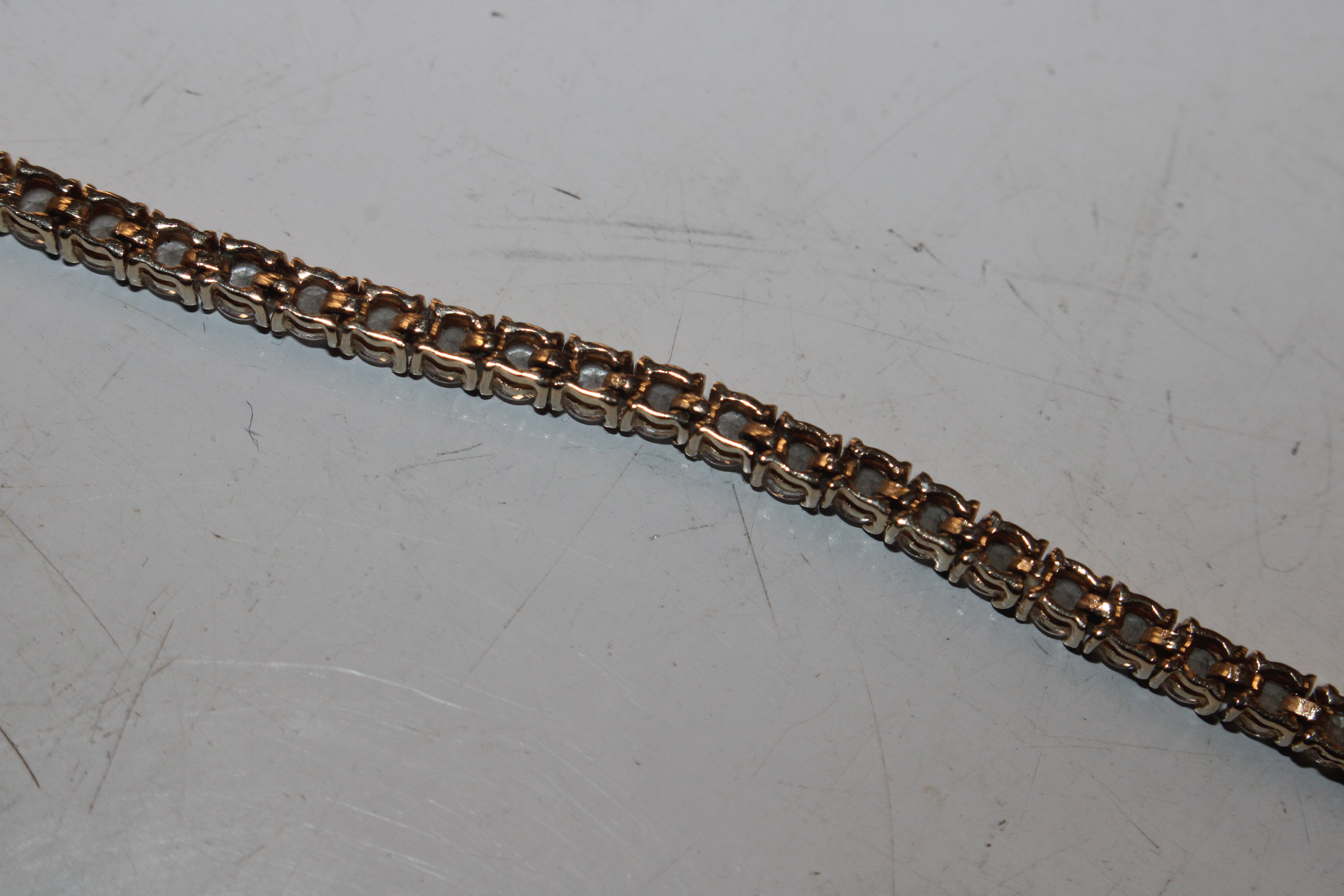 A 14ct gold and cubic zirconia set bracelet, appro - Image 7 of 8