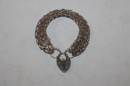 A solid Sterling silver chain bracelet with padloc