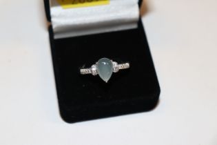 A 925 silver moonstone and diamanté set ring