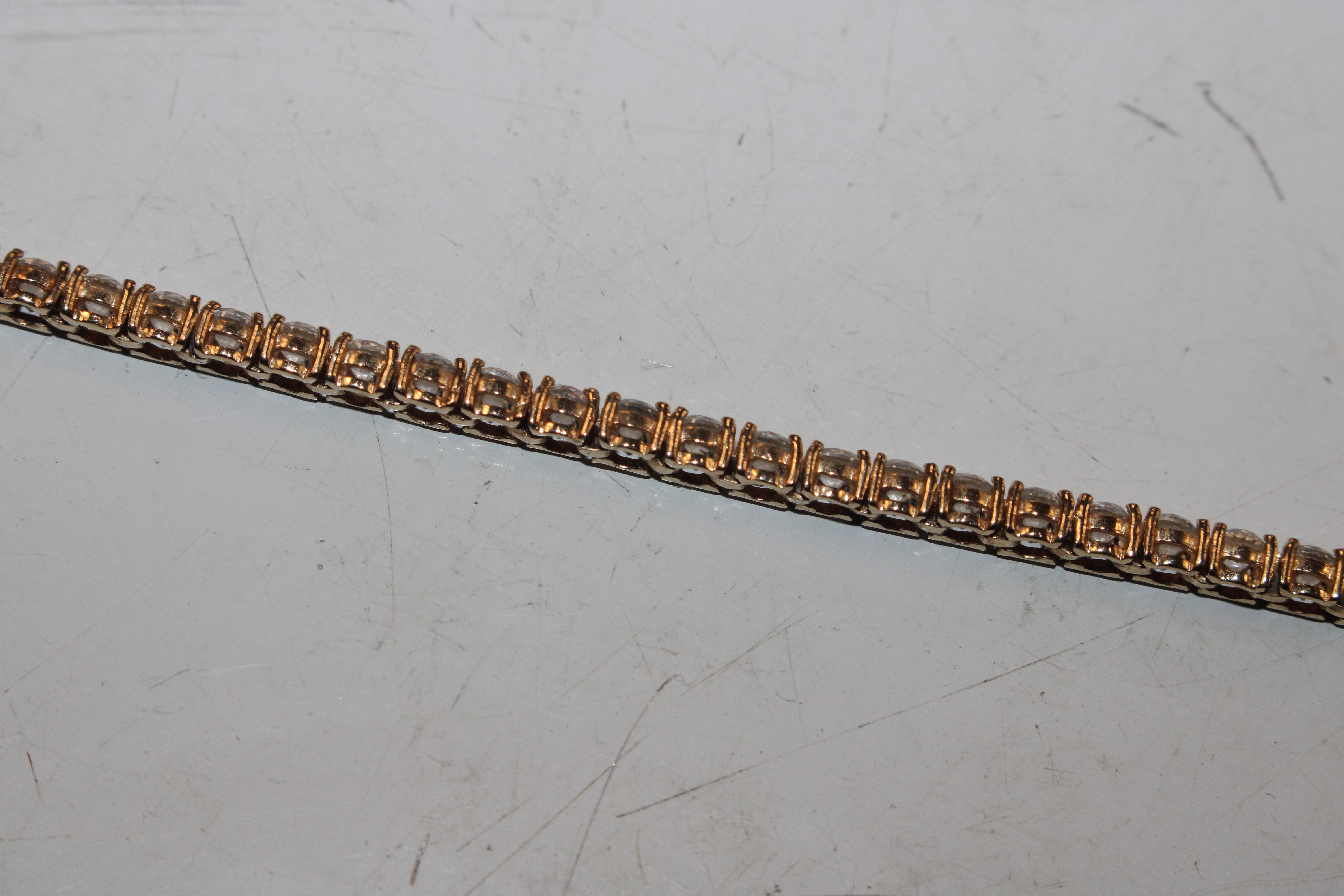 A 14ct gold and cubic zirconia set bracelet, appro - Image 6 of 8