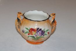 A Continental porcelain floral decorated twin hand