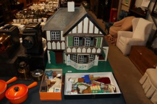 A dolls house and contents and contents of various