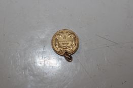An 1873 American gold $1 coin