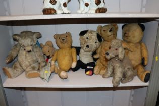 A collection of various vintage Teddy bears and so