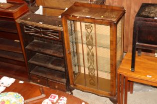 A mid-20th Century walnut glazed display cabinet