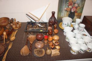 A porcupine quill desk top basket; various carved