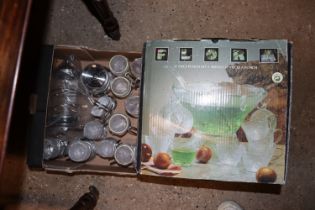 A 27 piece punch set - boxed; and a set of glass and metal ware comprising jug and beakers