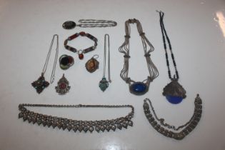 Two boxes containing various eastern style jewelle