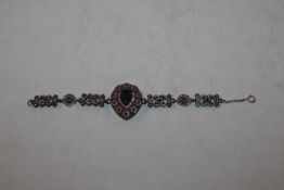 A paste set bracelet with Sterling silver clasp