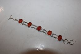 A Sterling silver and amber bracelet