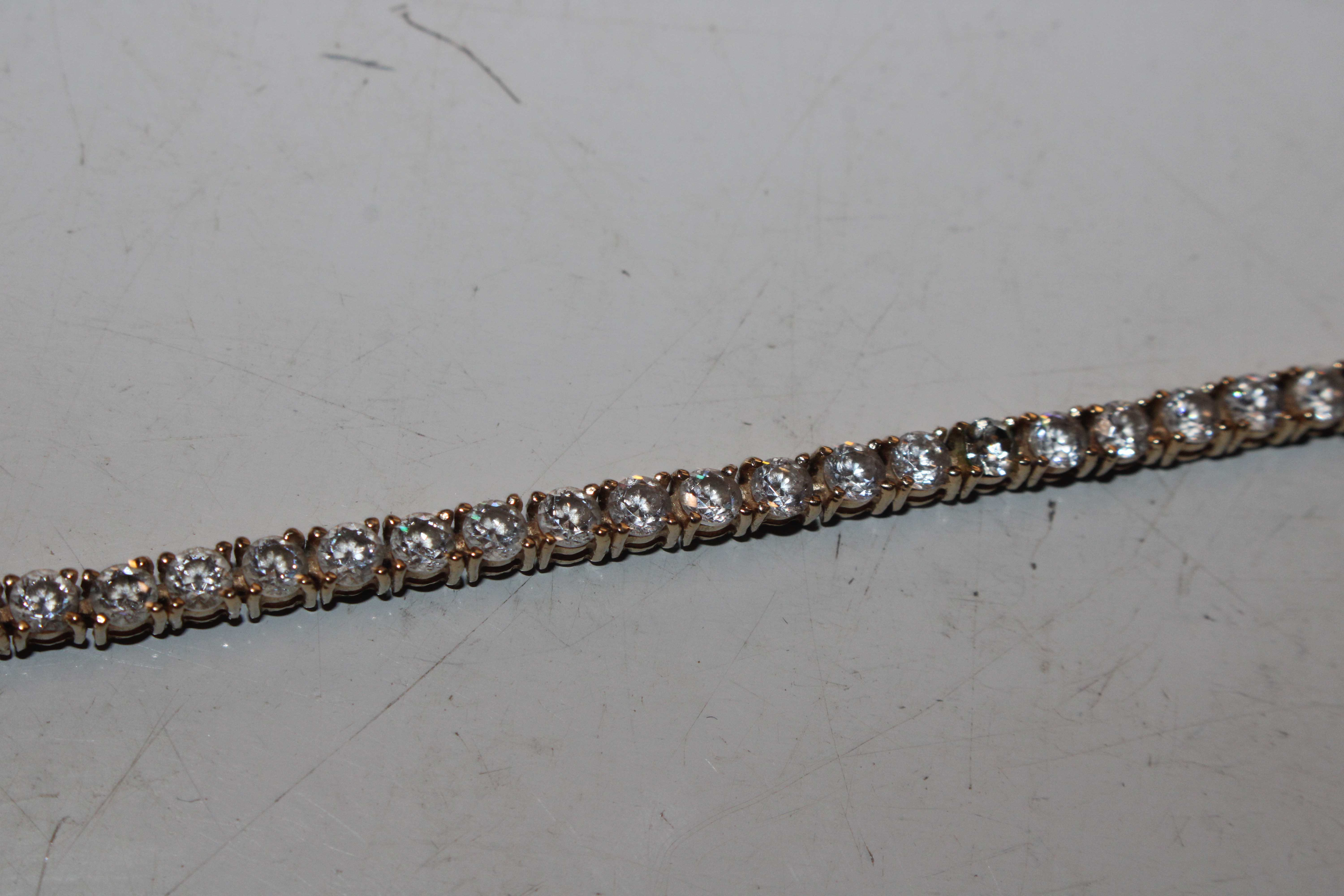 A 14ct gold and cubic zirconia set bracelet, appro - Image 4 of 8