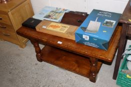 An oak two tier coffee table by Ellis