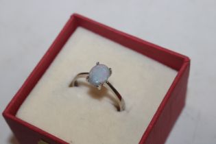 An 18ct white gold and opal doublet set ring, ring