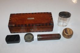 A wooden inlaid box and contents to include brass