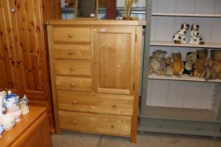 A modern pine combination wardrobe