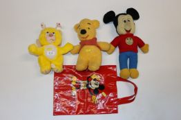 A vintage Micky Mouse Club toy and bag; a vintage