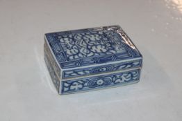 An antique Chinese blue and white decorated box an