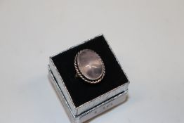 A rose quartz set ring